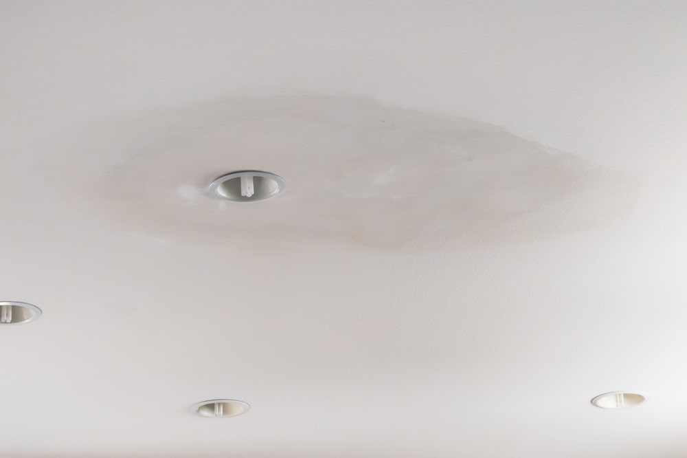 Signs of water leak causing damage to ceiling