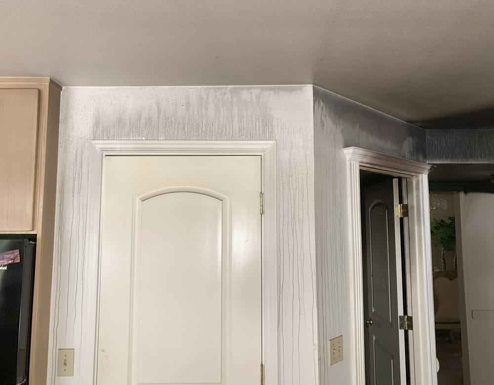 Smoke smell caused by residue on walls.